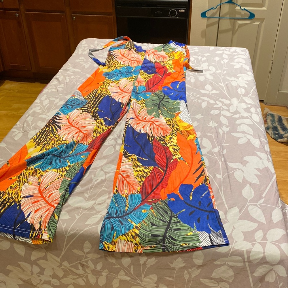 Wide leg halter jumper. Never worn.